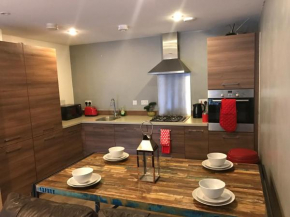 Отель Executive Brentwood Apartment  Бренвуд